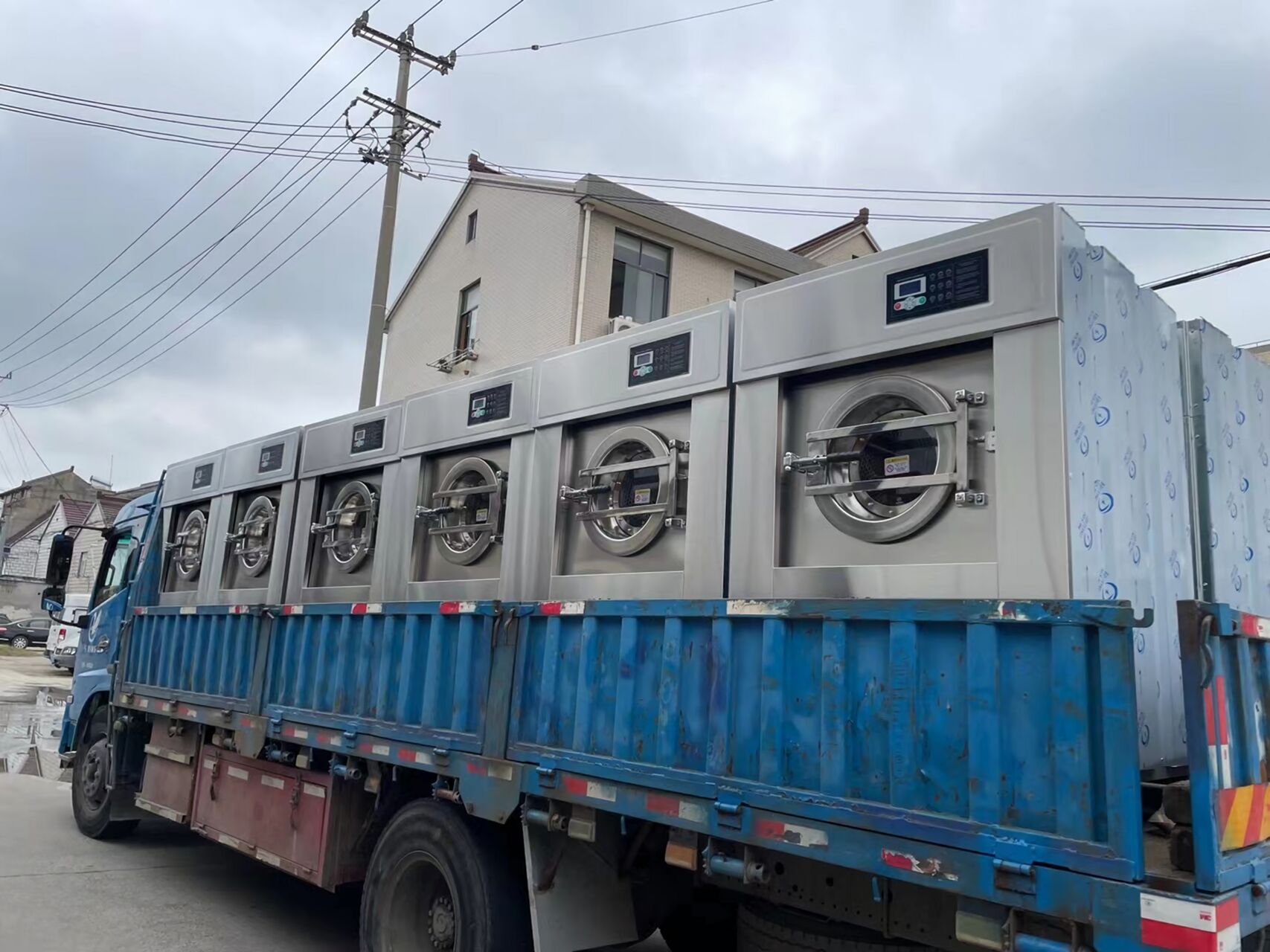 降低洗涤成本，从一台靠谱的工业洗衣机起头(图1)